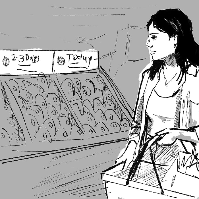 The produce shelf, every item already carrying a ripeness sticker applied by the store.